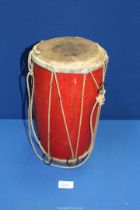 A Bongo drum, 12 1/2'' tall.