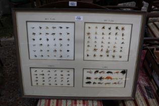 A framed collection of Fishing flies, 26'' x 20''.