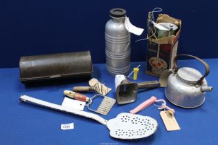 A boxed cream maker machine, an aluminium milk/water flask, a Sirram "The Wasp" camping kettle,