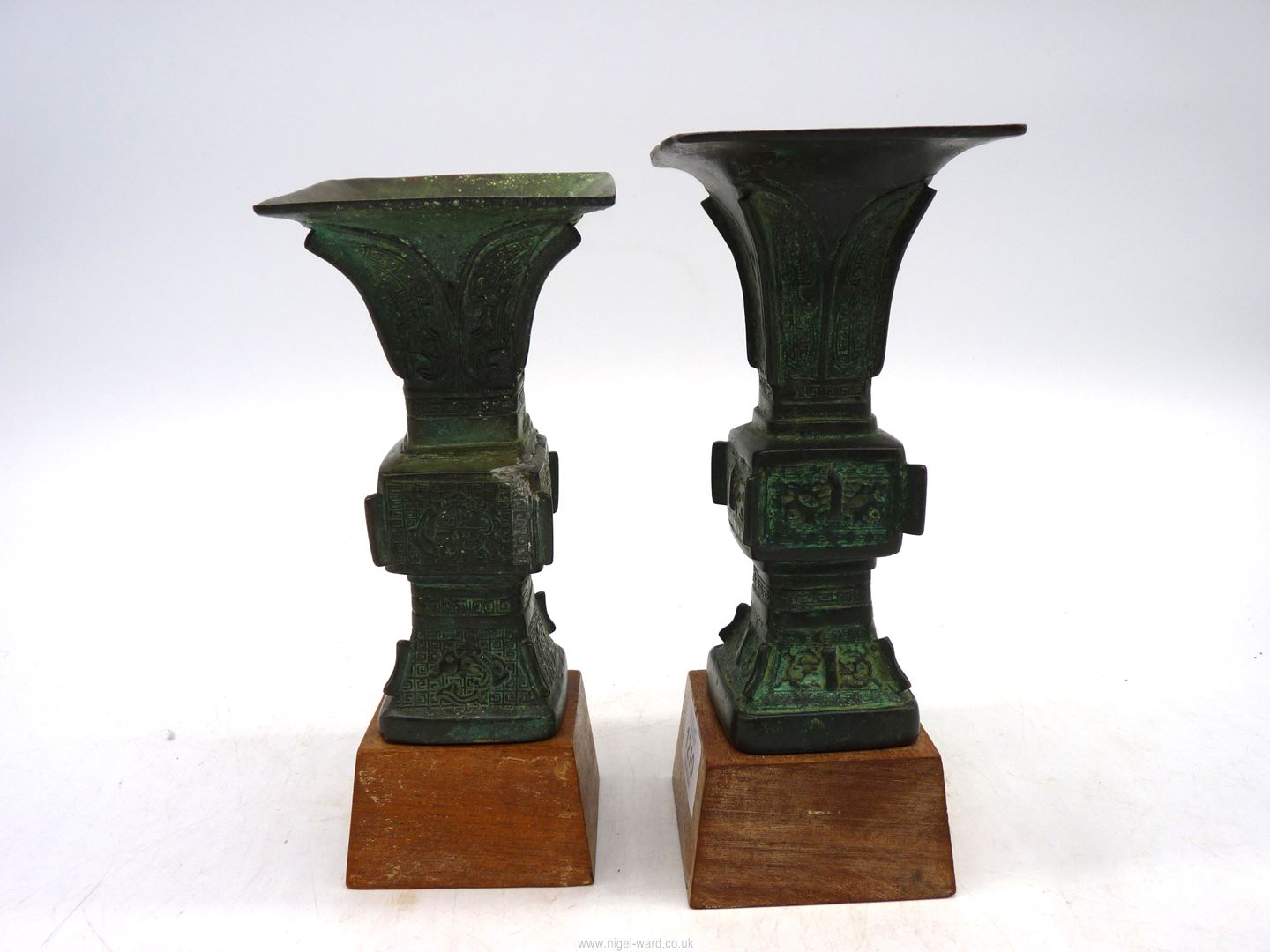 A pair of small Chinese bronze 'Gu' vases, probably Ming dynasty, on custom made wooden stands, - Image 7 of 18