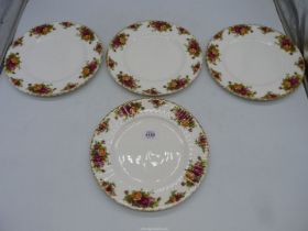 A set of four Royal Albert 'Old Country Roses' dinner plates, 10 1/4" diameter.