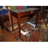 A contemporary Mahogany Side/Dining Table having a frieze drawer to one side and a drop leaf