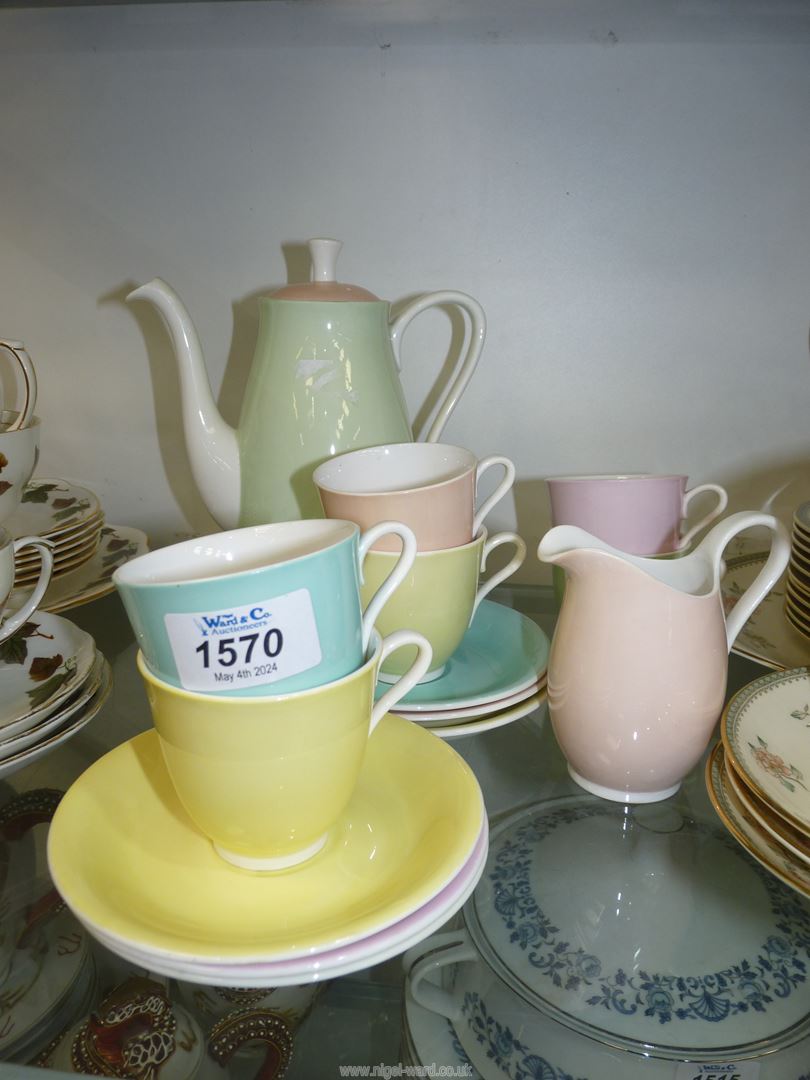A Retro pastel coffee set including; coffee pot, six cups & saucers and milk jug.