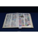 A blue 48 page stock book with approximately 2000 British,