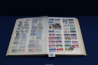 A blue 48 page stock book with approximately 2000 British,
