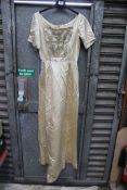 A Duchess silk satin Wedding Dress having metallic thread and beading detail to the front and