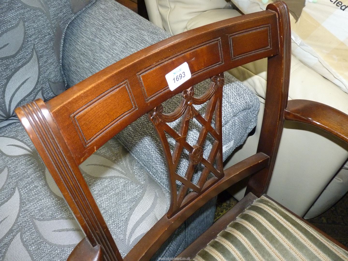 A Mahogany framed open armed Elbow Chair with a striped upholstered drop-in seat and a lattice - Image 3 of 4
