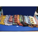 A quantity of silk and other fabrics including; screen printed, etc, various patterns; scroll,