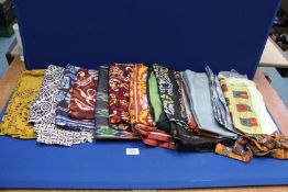 A quantity of silk and other fabrics including; screen printed, etc, various patterns; scroll,