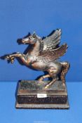 A metal figure of Pegasus, 12 1/2'' tall.