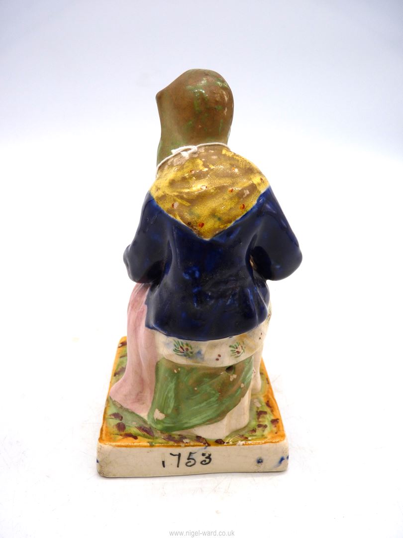 A Staffordshire figure of Dolly Pentreath - the last Cornish woman to speak the language, 7" tall. - Image 2 of 4
