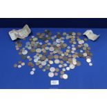 A quantity of pre-decimal and foreign coinage including; Cartwheel penny, silver 3d bits, Pesos,