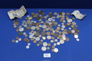 A quantity of pre-decimal and foreign coinage including; Cartwheel penny, silver 3d bits, Pesos,