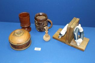 A quantity of items to include brass mounted circular box, life buoys bookends,