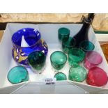 A box of glass including nine green glasses, two cranberry,