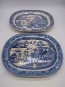 Two blue and white Willow pattern meat plates, one 'warranted Staffordshire semi china' a/f.