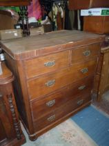 A veneered Pine carcassed Chest of three long and two short Drawers with drop handles,