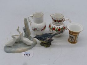A Nao group of geese, a Worcester miniature jug, a similar poppy jug,