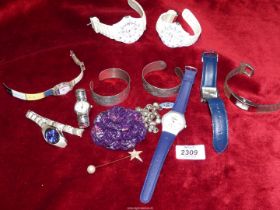A small quantity of costume jewellery and watches.
