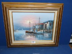 A framed Oil on canvas depicting a harbour scene with boats anchored, signed lower right W.