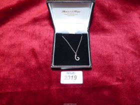 An 18ct. white gold Chain and 18 ct. Pendant with diamonds, stamped "750 LW".