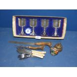 A small quantity of metals including plated goblets, horn handled carving knife and fork etc.