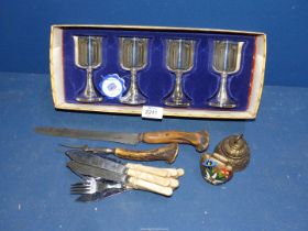 A small quantity of metals including plated goblets, horn handled carving knife and fork etc.