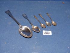 A set of three Silver coffee spoons, Sheffield 1902, a teaspoon,