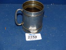 A silver Christening mug, Birmingham 1913 inscribed 'Willie Dec 8th 1915'.