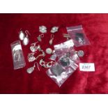 A quantity of 925 dropper Earrings including marcasite, floral, etc. and a pair with 9ct backs.
