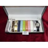 A cased Gossip ladies watch set with two watches and nine interchangeable bands, as new.