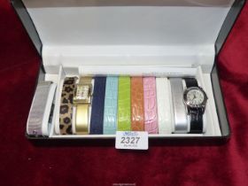 A cased Gossip ladies watch set with two watches and nine interchangeable bands, as new.