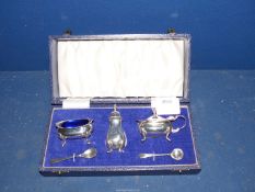 A boxed Mappin & Webb Silver Cruet set complete with liners and spoons,