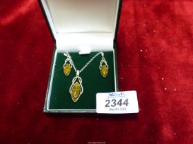 A pretty 925 Sterling Silver and amber lozenge shape Earrings and Necklace set.