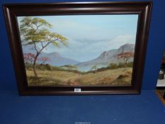 A framed Oil on board depicting an African landscape, signed lower left Piet Houthnysen?,