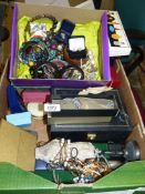 A large quantity of costume jewellery including bangles, necklaces, earrings.