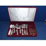 A red velvet covered Canteen of Cutlery for six place setting.