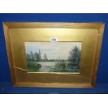 A framed and mounted Watercolour written verso "On The Thames", signed lower left R.M.