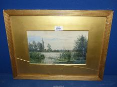 A framed and mounted Watercolour written verso "On The Thames", signed lower left R.M.