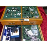 A large jewellery Box, with key, containing costume jewellery including rings, earrings,