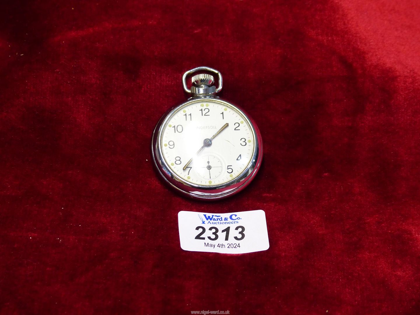 A vintage Ingersoll silver tone pocket watch.