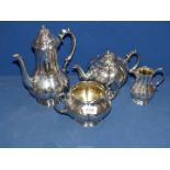 An attractive four piece Epns Teaset with lobed bodies comprising Teapot, hot water Jug,