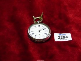 A Swiss silver cased Pocket Watch having inset seconds dial, with key.