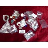 A quantity of pendants and charms, mostly 925 Sterling Silver including silver locket, turtle charm,