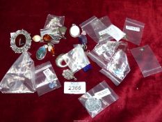 A quantity of pendants and charms, mostly 925 Sterling Silver including silver locket, turtle charm,
