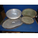 Four silver plated gallery trays.