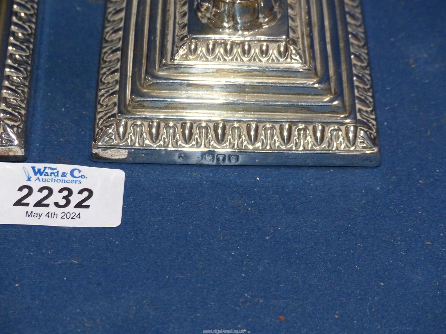 A pair of weighted George V Silver Candlesticks having column form on square bases with acanthus - Image 2 of 2