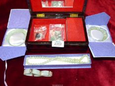 A small quantity of Jade and Sterling Silver jewellery including earrings, necklaces, bangles, etc.