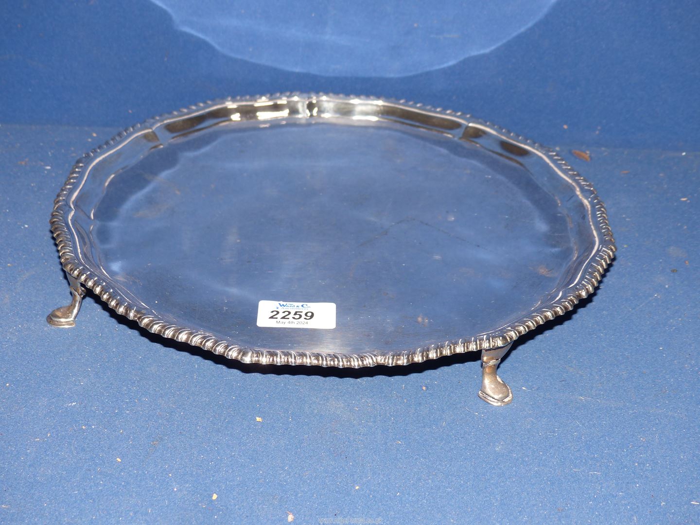 A Silver Salver standing on four hoof feet, London 1934, maker Edward Barnard & Sons Ltd.