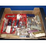 A good quantity of plated cutlery including serving spoons, knives, forks, fish eaters, etc.